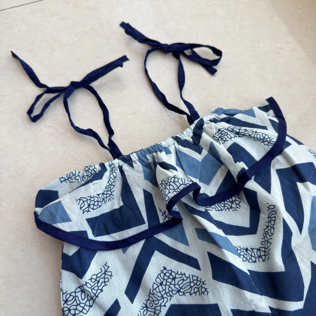 Double-layer Cotton Jumpsuit in Indigo Chevron, real photo: ruffle detail