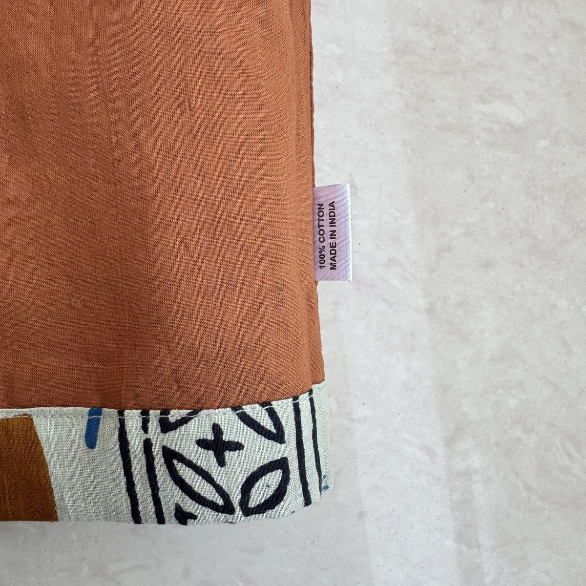 Double-layer Cotton Pant, rust with heart print, real photo: rust side cuff and care label