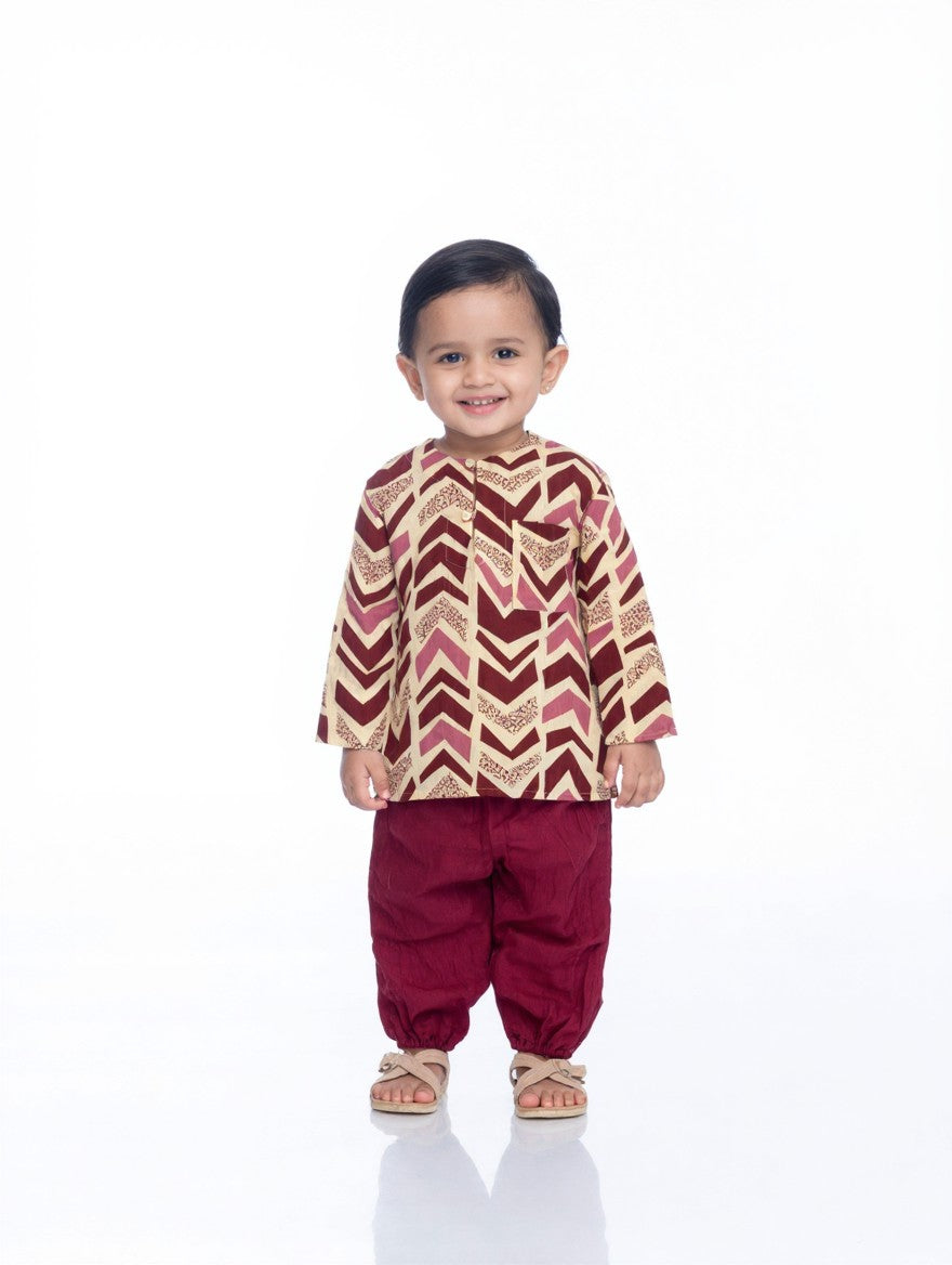 Rosewood Chevron kurta set on a toddler, white background (styled image)